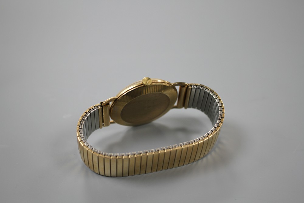 A gentlemans 1960s 9ct gold Avia manual wind wrist watch, on a gold plated strap, with Avia box.